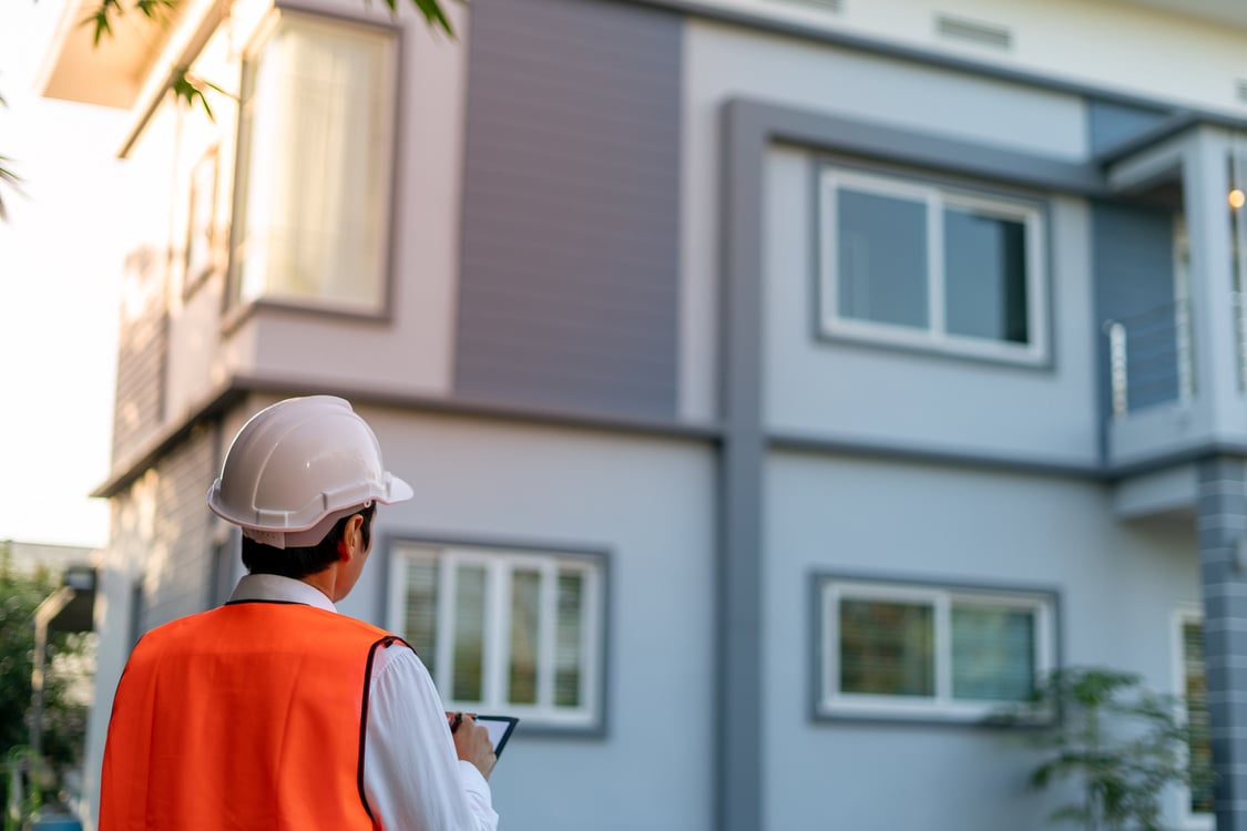 Inspector or engineer is checking and inspecting the buildin