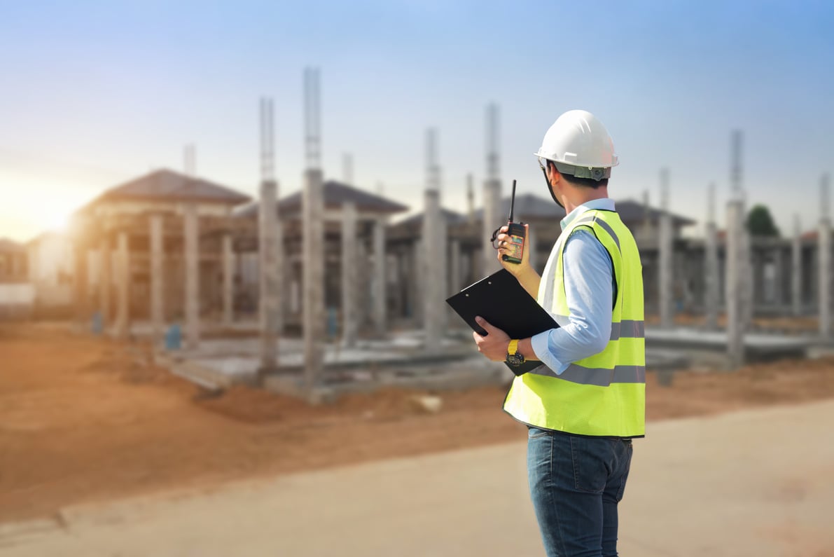 Civil engineer working in building construction site